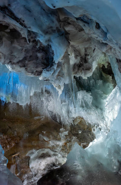 istock Great ice formation in a natural small glacial ice cave 1948107425