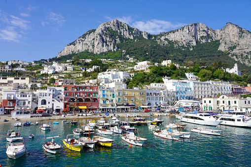 CAPRI, ITALY - MAY 2, 2022: Wonderful view from the sea of Marina Grande port of Capri Island, Italy