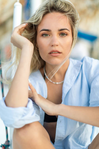 istock A beautiful young woman sitting on a boat deck 1948158905