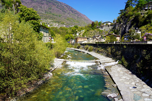 Beautiful view of Mallero Adda river in Sondrio, Valtellina, Italy