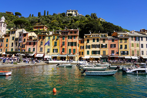 PORTOFINO, ITALY - APRIL 17, 2023: Portofino touristic harbour on summer day, Genoa, Italy