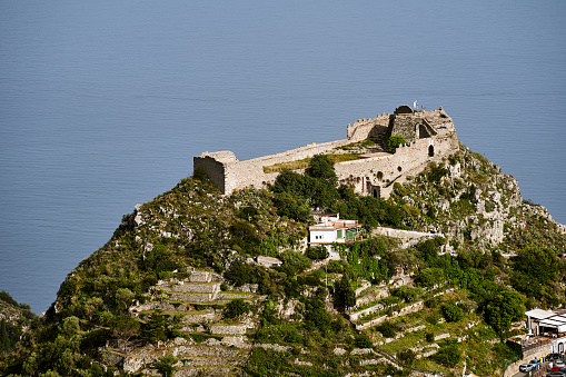 ruins of the medieval castle Castello saraceno in the city of Taormina on the island of Sicily, Italy