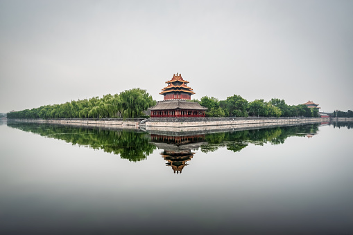 Gray, foggy and polluted day at the North-East corner tower outside the Forbidden City in central Beijing.