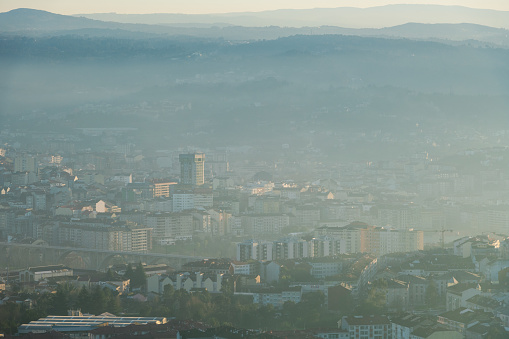 Panorama view of the skyline of the Galician city of Ourense at dusk as seen from the outskirts.