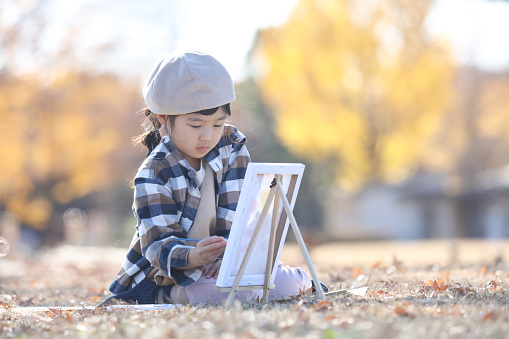 girl drawing a picture