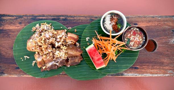 istock Garlic pork belly with spicy sauce and salad 1948806623