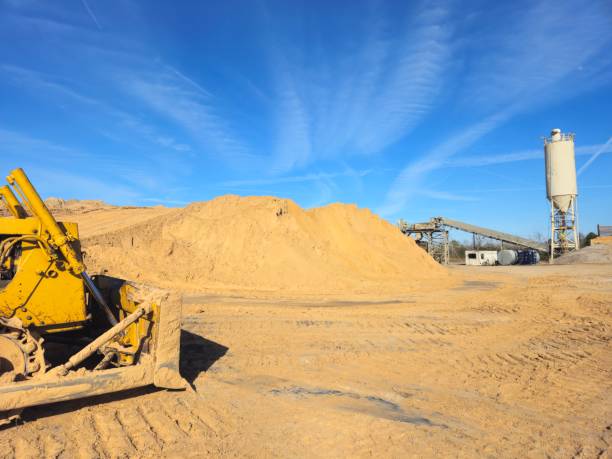 istock Construction Site Dirt Field With Bulldozer In Foreground 1948843746