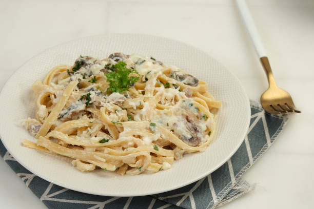 istock Fettuccine Pasta With Creamy Mushroom Sauce 1948871455