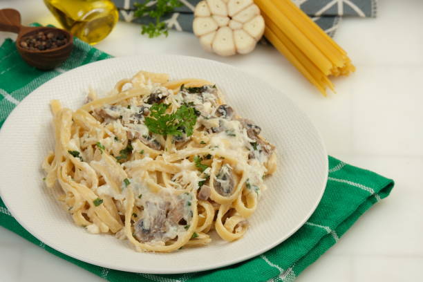 istock Fettuccine Pasta With Creamy Mushroom Sauce 1948888326