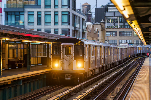 Queens train on the New York City subway arrives at the Court Square station