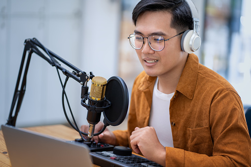 A close up image of proffesional studio microphone isolated on the white background