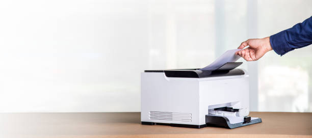 istock Printer, copier, scanner in office. Workplace ,photocopier machine for scanning document printing a sheet paper and xerox photocopy. 1949071543