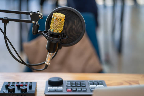 istock Close-up of microphone in radio broadcast studio 1949094642