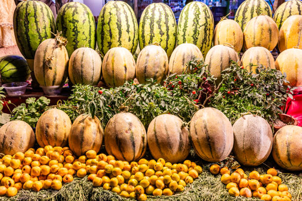 Fruits and vegetables for sale at La Boqueria, world famous market in Barcelona, Spain.