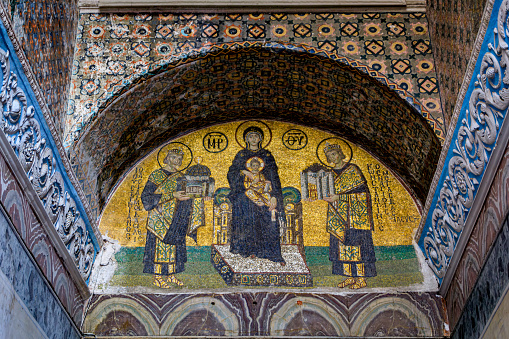 Istanbul, Turkey - November 8, 2023: Ornate goldleaf mosaic of Virgin Mary, Jesus, Constantine and Justinian at a Hagia Sophia Grand Mosque entrance
