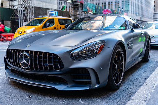 New York City, USA - August 09, 2023: Mercedes Benz AMG GT 2018 luxury sport car, low corner view.