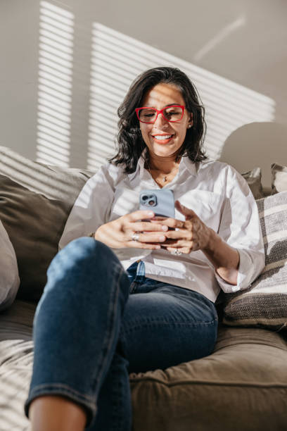 Mature woman relaxing at home