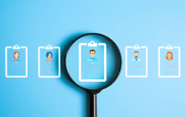 Entrepreneur using electronic magnifier for store customer data to gain customer insight in order to create marketing campaign that can help to increase sale and identify potential customer.