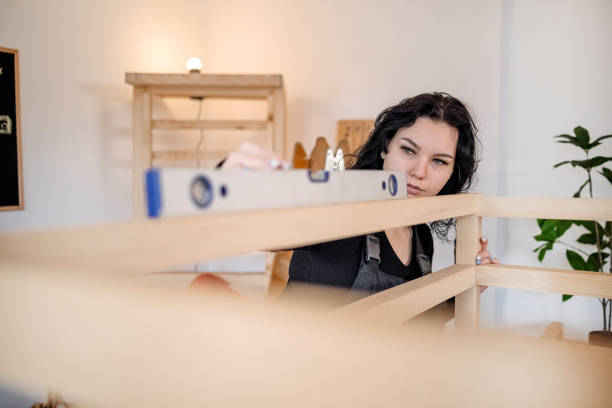 istock Woman starting small business working as carpenter 1949217177