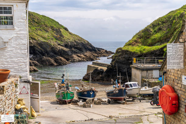 Portloe, Cornwall, England, UK - May 29, 2022: Fishing boats on Portloe Beach