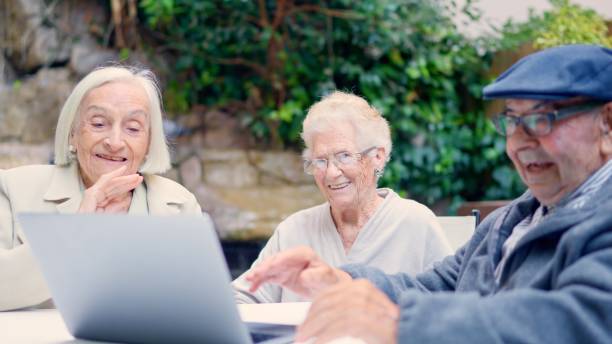 istock Seniors of geriatric waving during a video call 1949240841