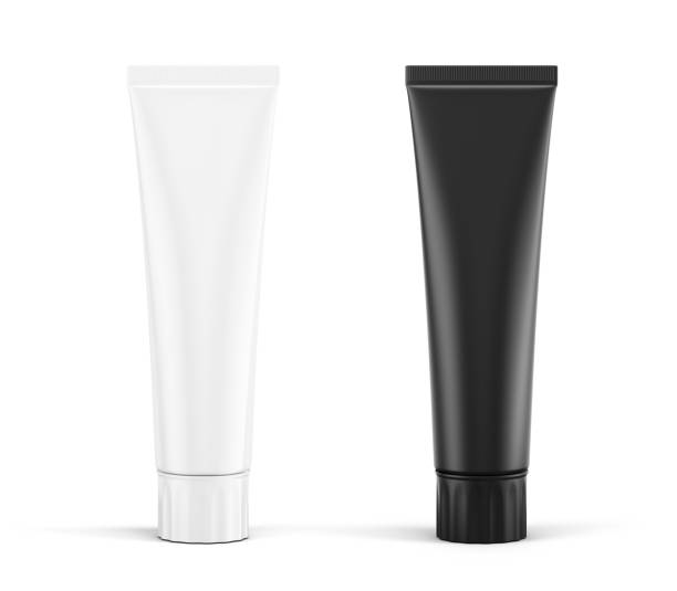 istock Blank white and black tubes mockup for cream, tooth paste, gel. Empty cosmetic paste plastic packaging. 3d rendering 1949242402