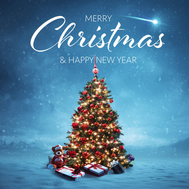 istock Christmas card with decorated tree and wintry landscape 1949247534