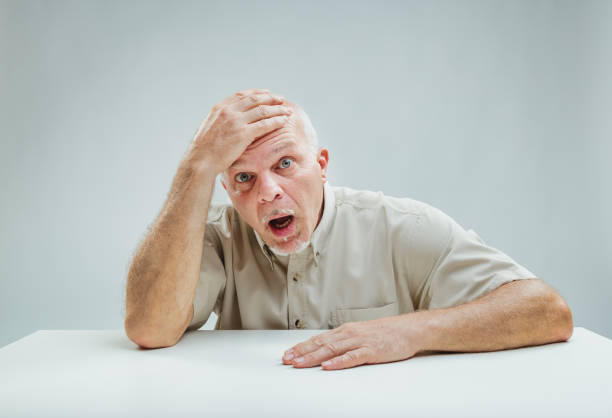istock Shocked man receives startling information, shows disbelief 1949276829