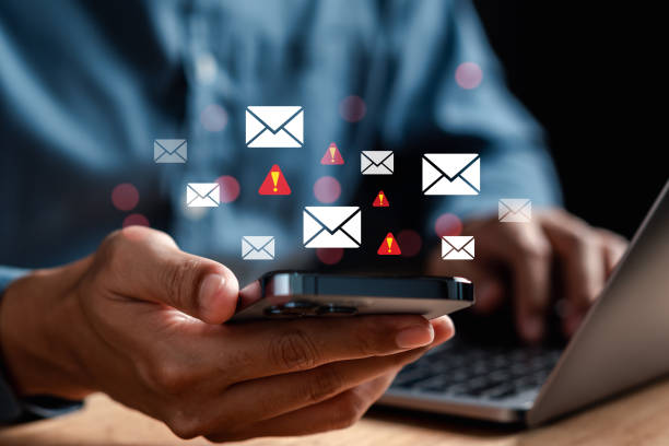 istock Alert Email inbox and spam virus with warning caution for notification on internet letter security protect, junk and trash mail and compromised information. 1949285796