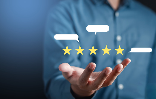 Businessman showing five star on hands, Customer satisfaction feedback review concept. Customer online service experience and business satisfaction.