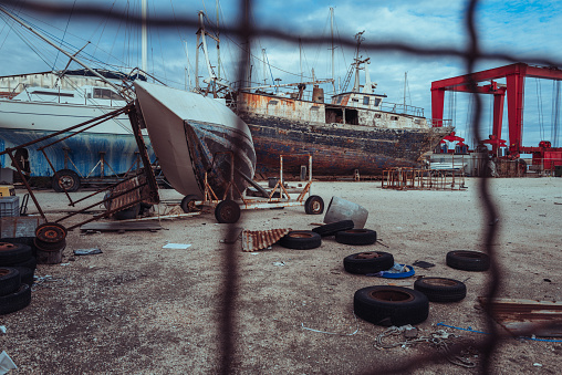 Typical Mediterranean fisheries. Mediterranean fisheries: old trawlers at shipyard of Civitanova Marche