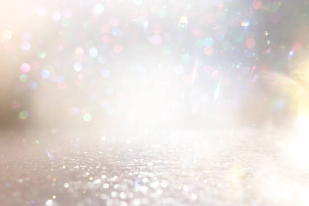 istock abstract glitter silver, gold lights background. de-focused 1949293508