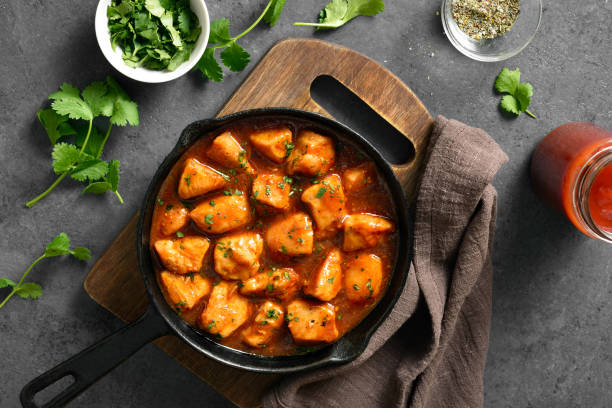 istock Sweet and spicy chicken bites with sauce 1949298305