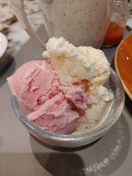 istock vanilla and strawberry ice cream 1949320582