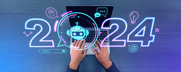 istock Top view man hands with laptop, virtual assistant and 2024 year hologram 1949324014