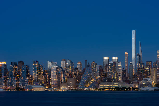 istock New York west side and panoramic view on office buildings at night 1949330721