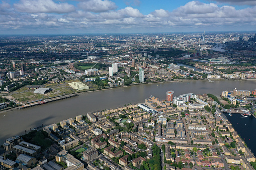 The River Thames close to Canary Wharf business district .The high angle image was captured during summer season.