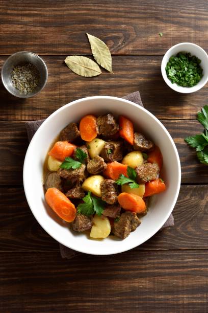 istock Beef meat stewed with potatoes, carrots and spices 1949404919
