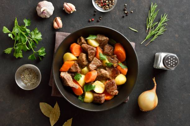 istock Beef stew with potatoes, carrots and greens 1949404922