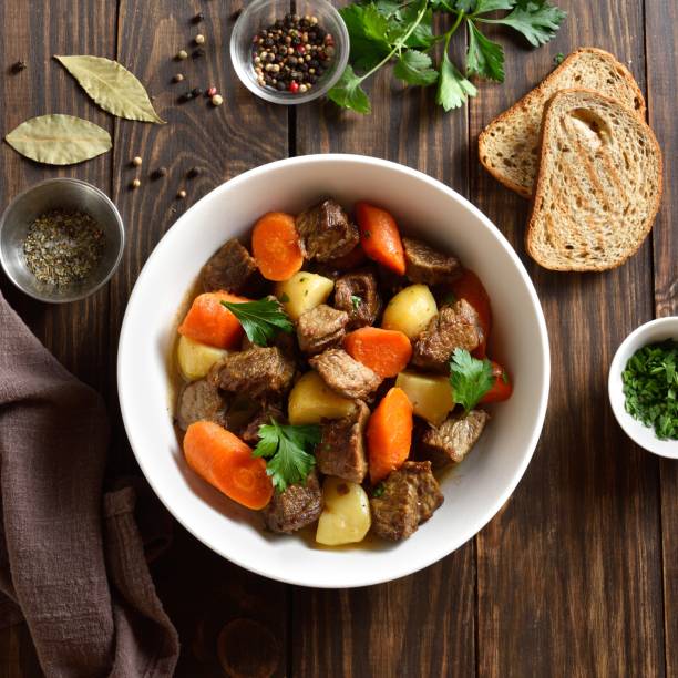 istock Beef meat stewed with potatoes, carrots and spices 1949404926
