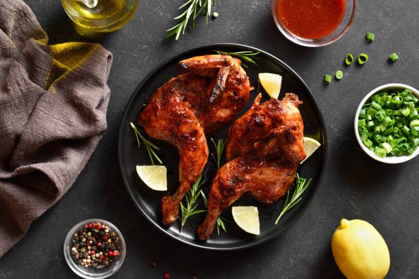 istock Grilled half chicken with lemon and rosemary 1949430508
