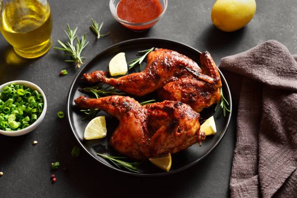 istock Grilled half chicken with lemon and rosemary 1949430521