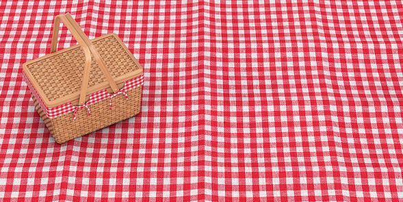 Wicker Picnic Wooden Basket on a Red Checkered Picnic Tablecloth Blanket extreme closeup. 3d Rendering