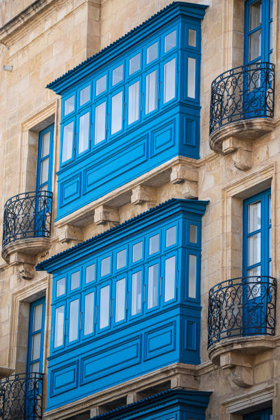 Traditional colorful enclosed wooden balconies, called gallarij in the Island of Malta.