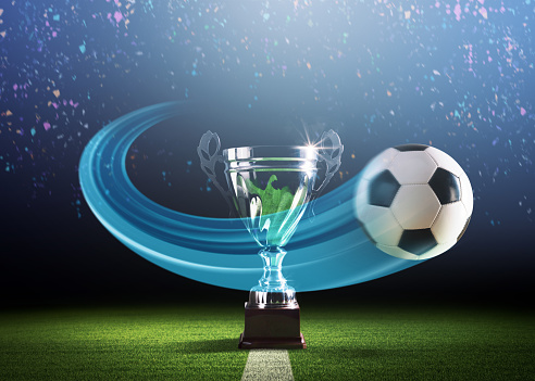 3D Trophy cup and soccer ball. 1st place award. Football game and gold reward. Winner concept. Victory prize icon isolated on white background. Cartoon creative design illustration. 3D Rendering