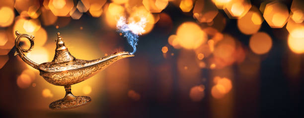 istock Golden magic lamp and bokeh lights background 1949506553