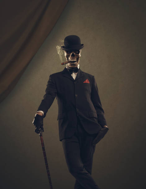 istock Scary character with skull head portrait 1949511348