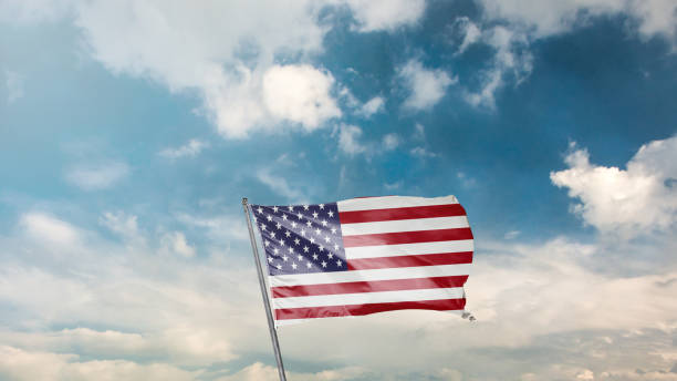 istock flag of america on blue sky background 1949558952