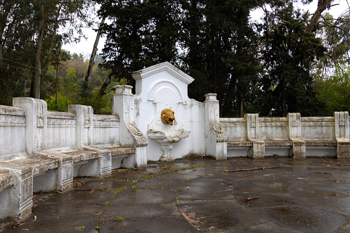 Destroyed marble fountain with benches in Gagra, Abkhazia, Georgia