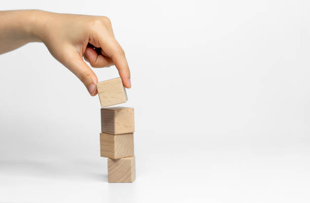 istock building wood blocks on white background; business or creative concept 1949580843